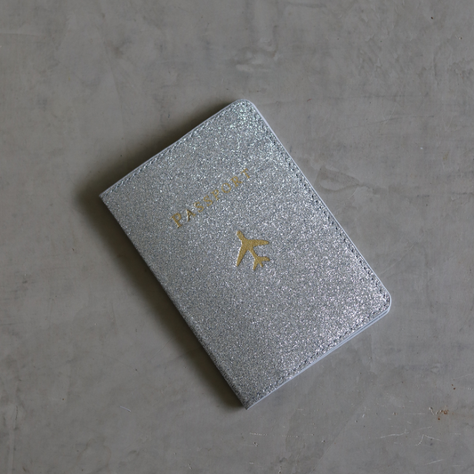 travel tag with shimmer silver and a plane graphic-travel-lynne_1