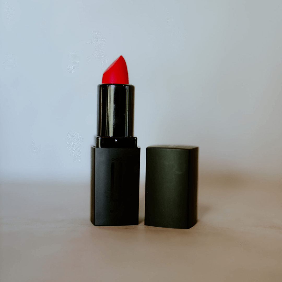 Red with coral undertone trophy wife matte lipstick lynné